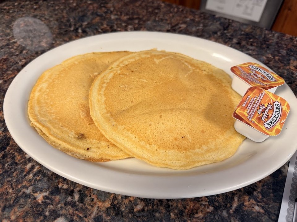 Golden Pancakes with Syrup